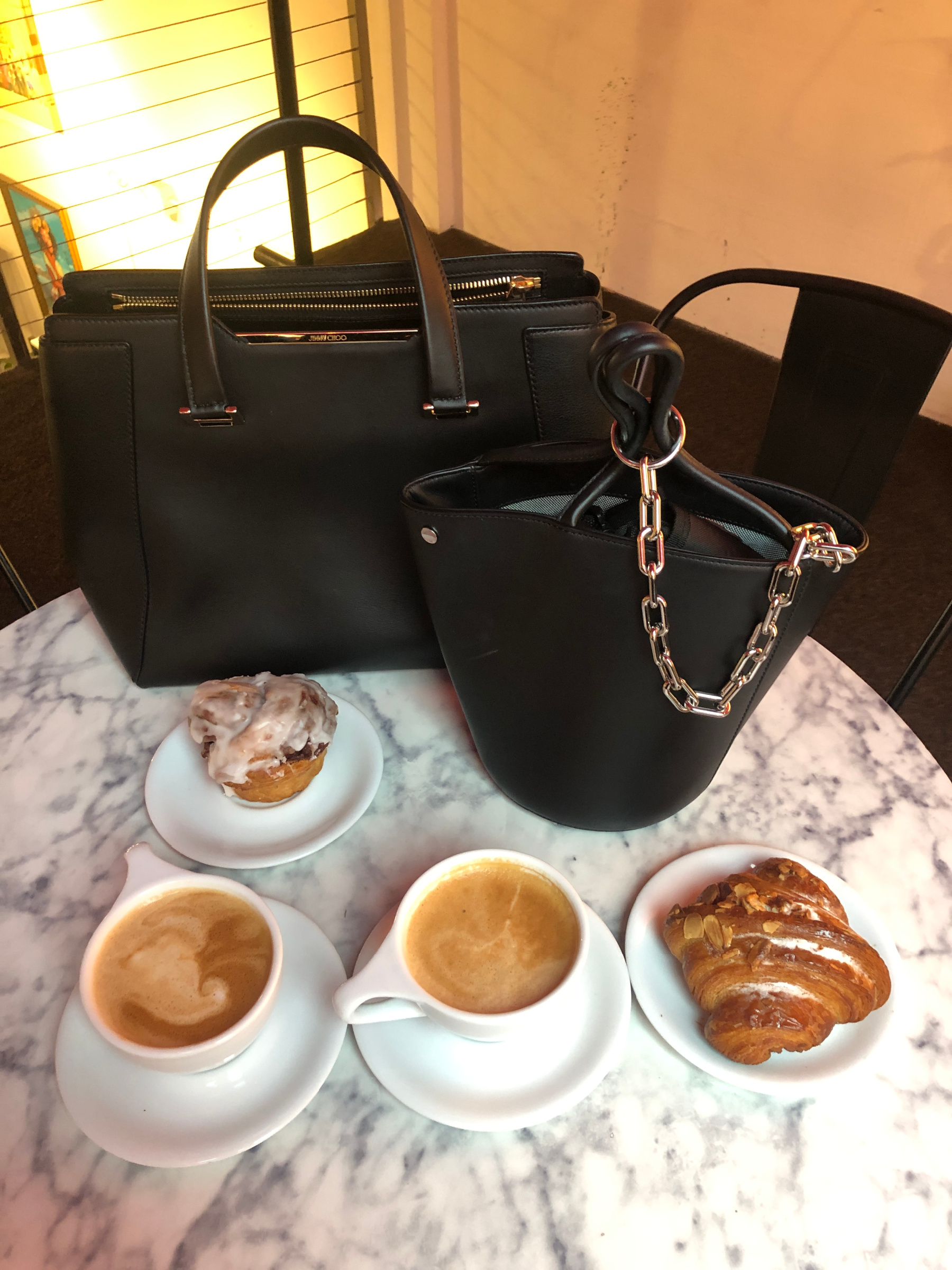designer bags and coffee and pastries